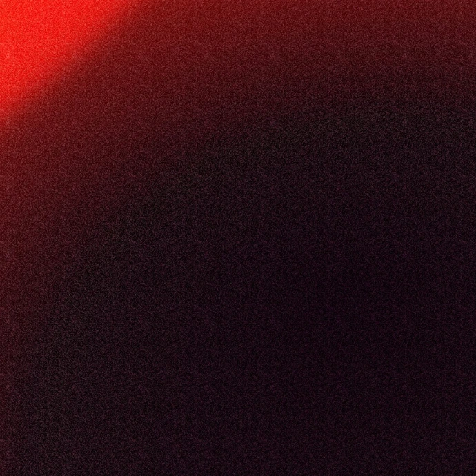 a blurry image of a red and black background